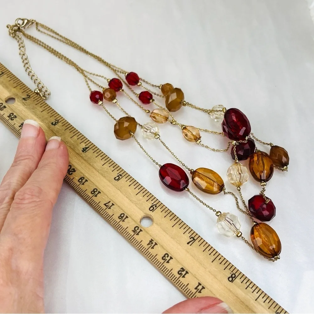 Pretty multi strand, red, clear and orange costume necklace